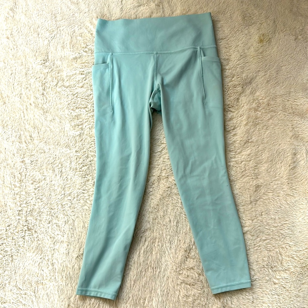 Athleta salutation stash 7/8 tights in mint
